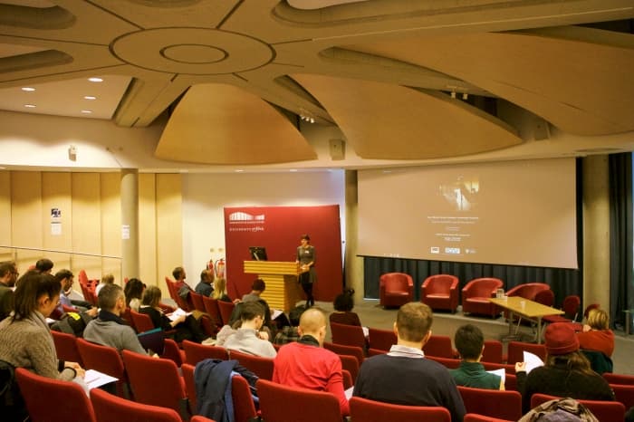 Image of Romana Turina speaking to an audience